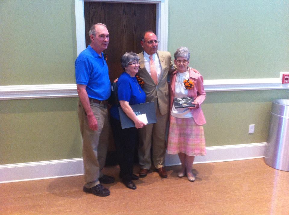 President Bill Greer with retirees Gary Leek, Carolyn Woolard, and June Leonard